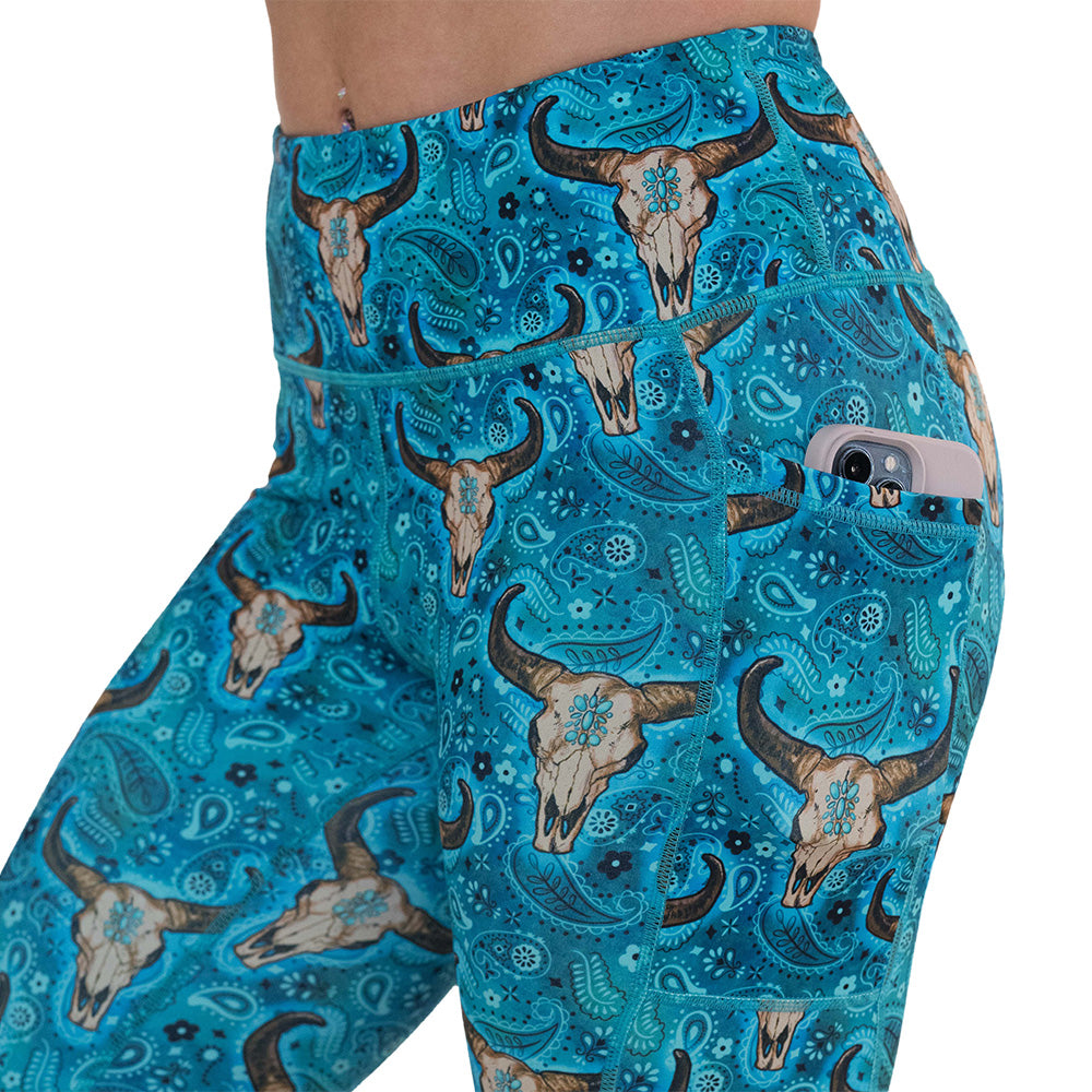 side pocket on the teal cow skull print leggings