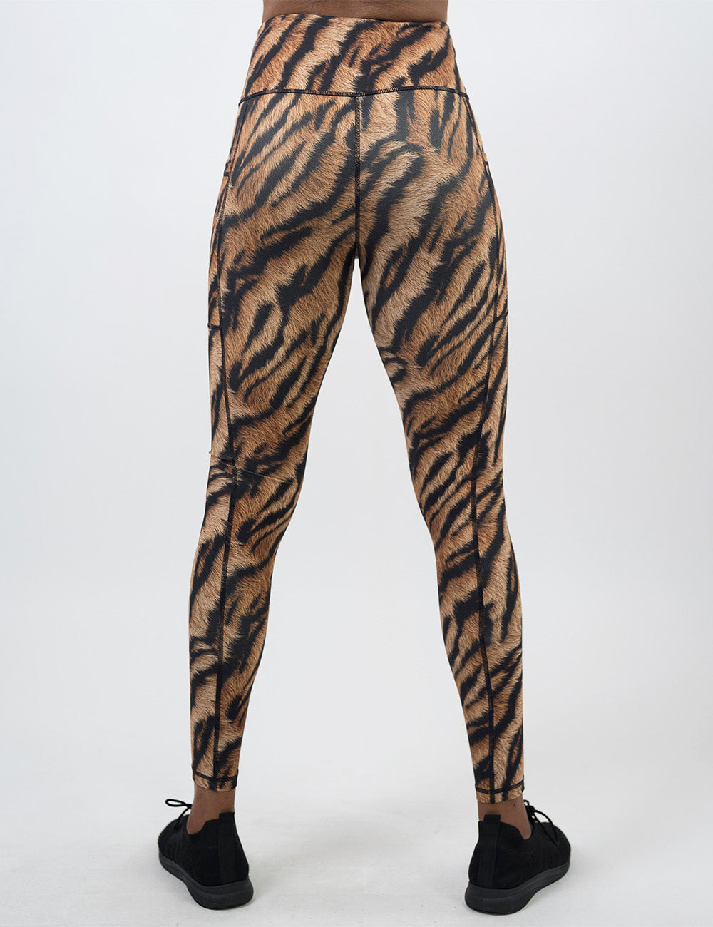 back of the full length tiger print leggings against a white background