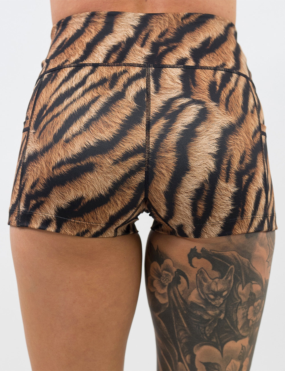 back of the 2.5 inch tiger print shorts against a white background
