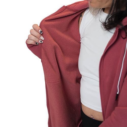 inside of the dark pink zip up sweatshirt