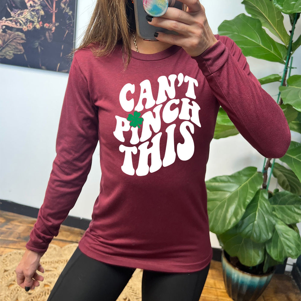 heather cardinal long sleeve with the words "can't pinch this" with a clover above the "i" of "pinch"