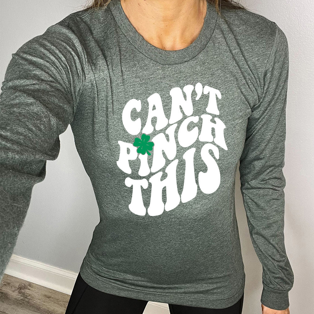 heather forest long sleeve with the words "can't pinch this" with a clover above the "i" of "pinch"