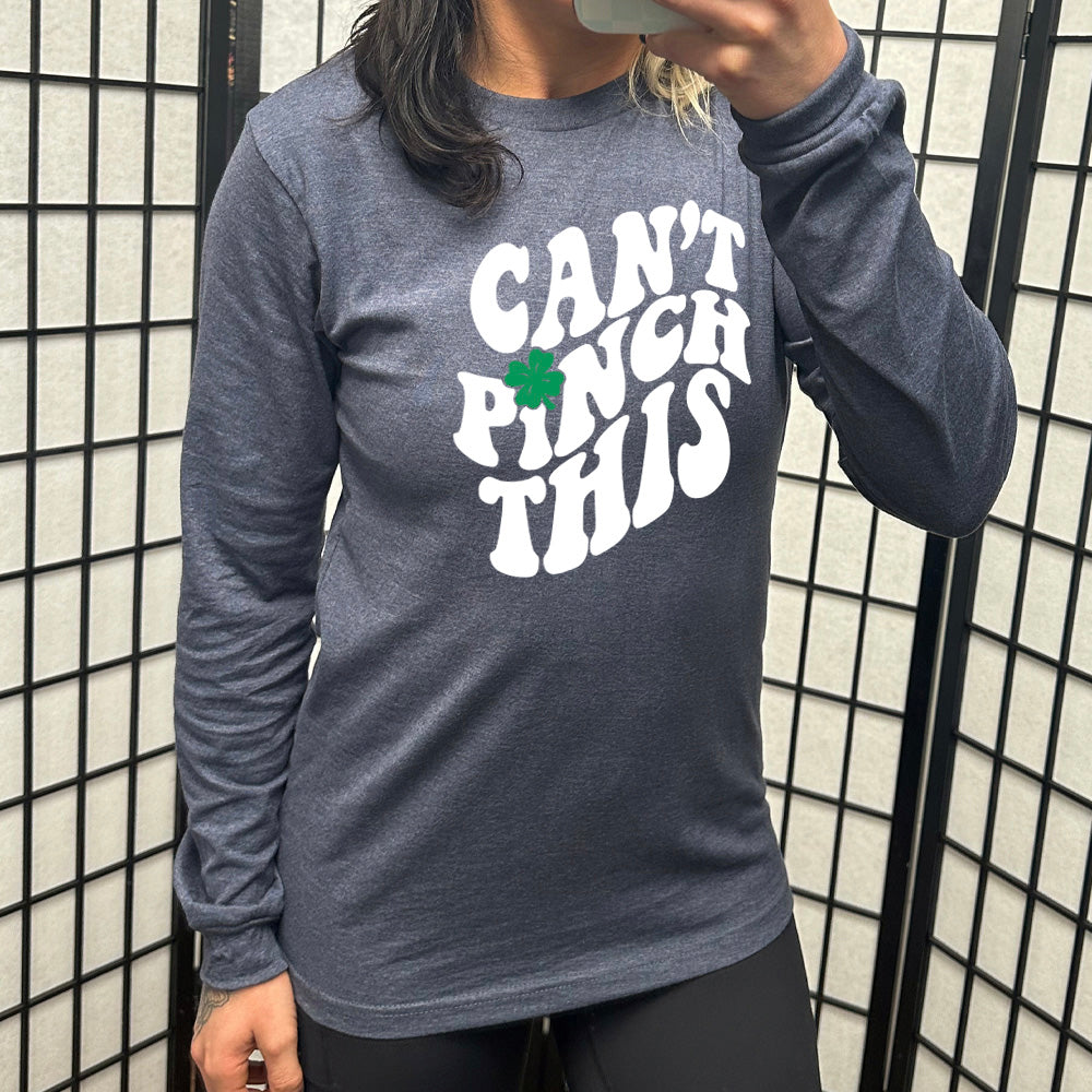 heather navy long sleeve with the words "can't pinch this" with a clover above the "i" of "pinch"