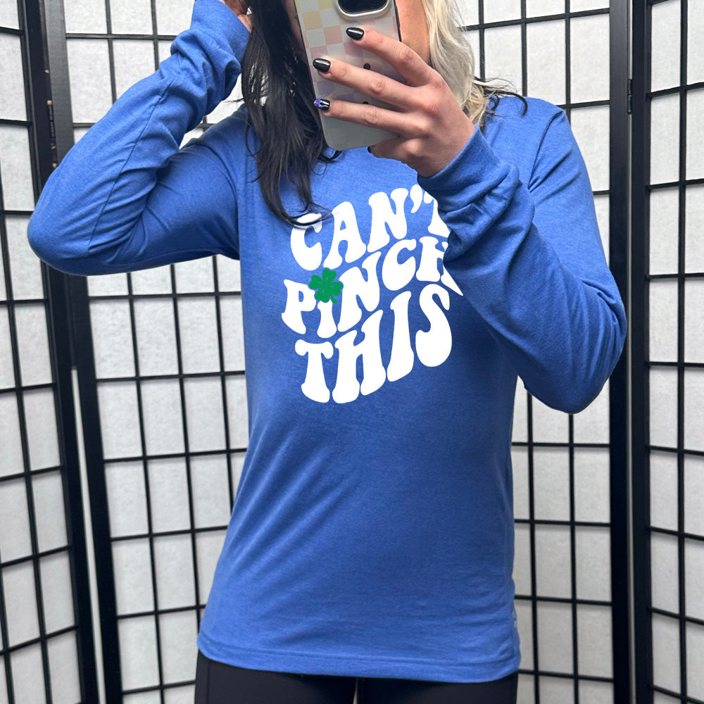 heather true royal long sleeve with the words "can't pinch this" with a clover above the "i" of "pinch"
