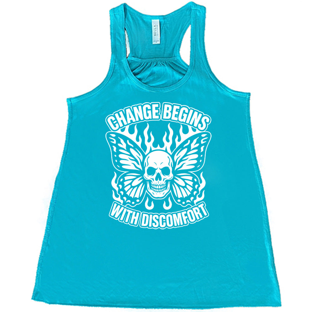 teal flowy tank with the words "change begins with discomfort" surrounding the graphic of a skull with flaming butterfly wings