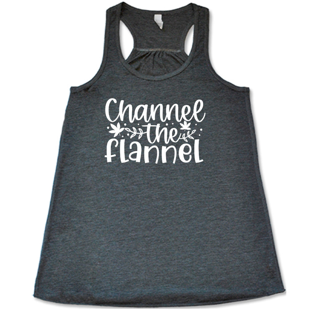 Grey colored flowy tank with fall leaf graphic on it that says "Channel The Flannel"