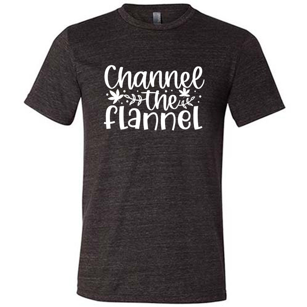 Black colored shirt with fall leaf graphic on it that says "Channel The Flannel"