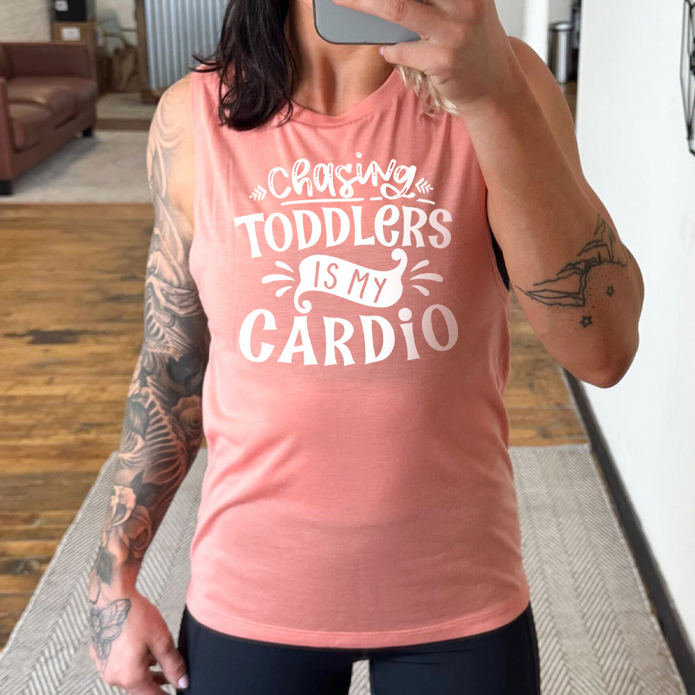peach muscle tank with a graphic on it that says "Chasing Toddlers is My Cardio"