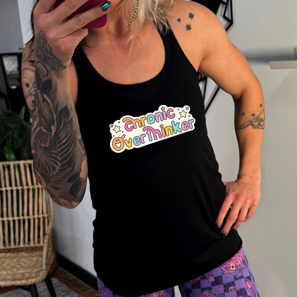 black shirt with the quote "Chronic Overthinker" on it