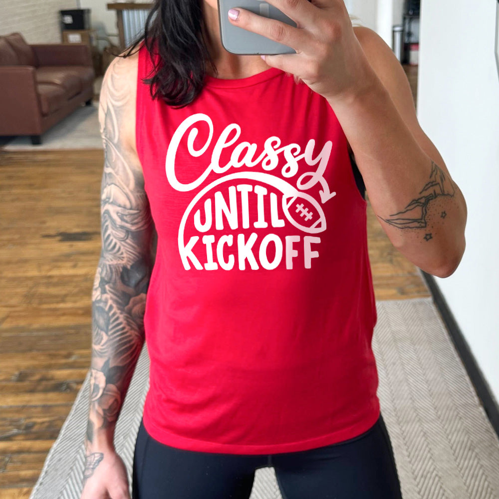 Model wearing red colored muscle tank with football graphic on it that says "Classy Until Kickoff"