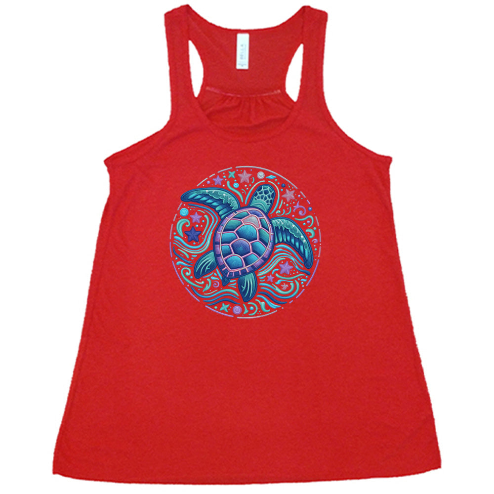 Red colored flowy tank with a colorful turtle graphic on it