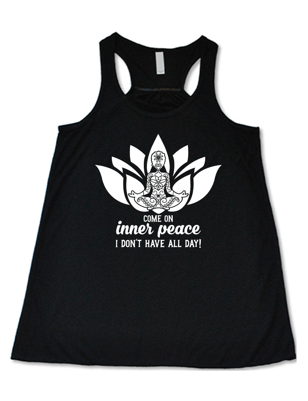 black flowy racerback tank with the graphic of a patterned person's silhouette doing a seated yoga pose, sitting in a lotus shape, with the words underneath saying "come on inner peace I don't have all day!