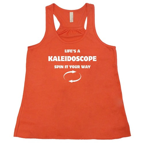 coral racerback shirt with the saying "Life's A Kaleidoscope Spin It Your Way" on it