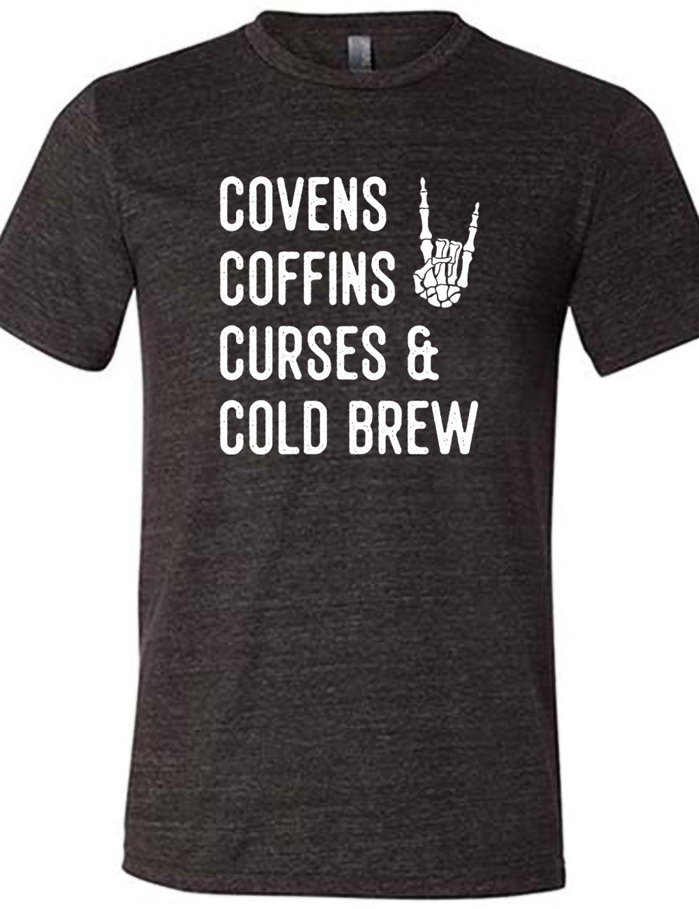 black unisex tee with the words listed "covens coffins curses & cold brew" and the graphic of a skeletal rocker hand