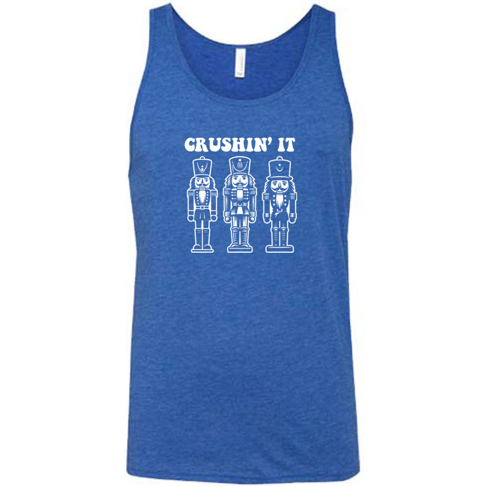 blue shirt with the text "Crushin' It" with nutcracker graphics on it