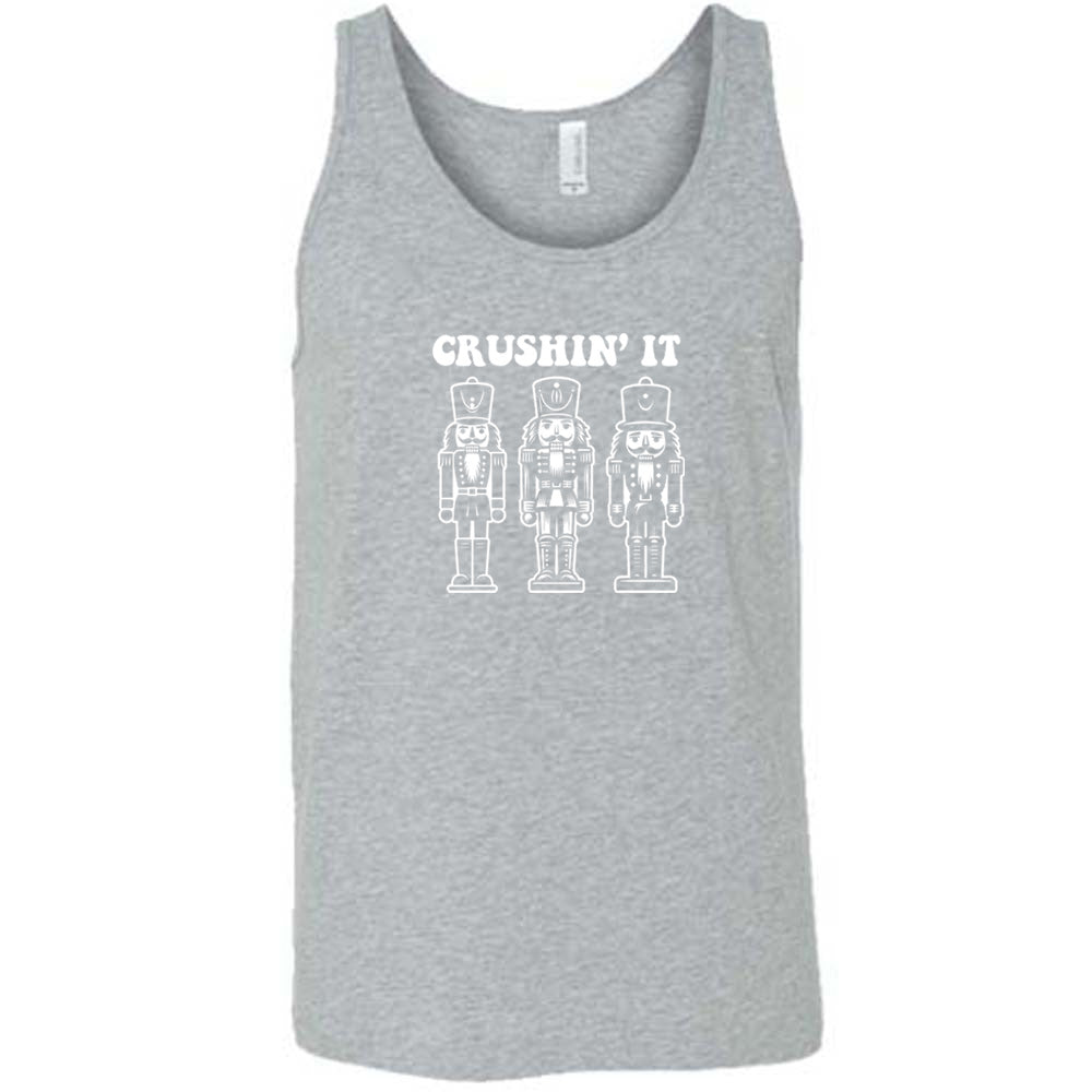 grey shirt with the text "Crushin' It" with nutcracker graphics on it