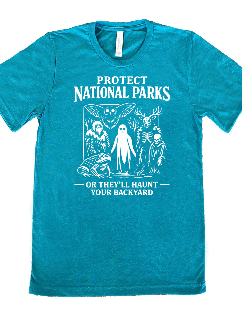 teal unisex tee with the words on it saying "Protect National Parks" and a graphic of various cryptids, and underneath words saying "or they'll haunt your backyard"