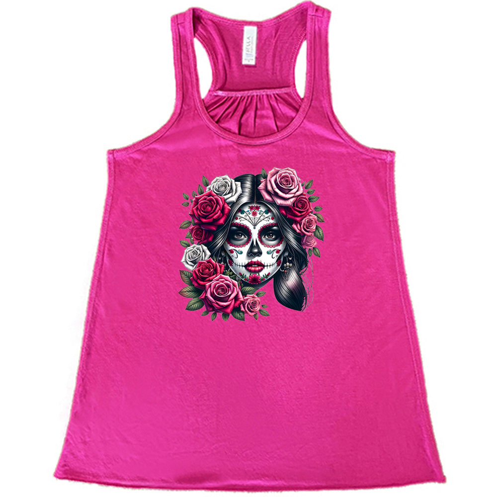 berry shirt with a Day Of The Dead graphic on it