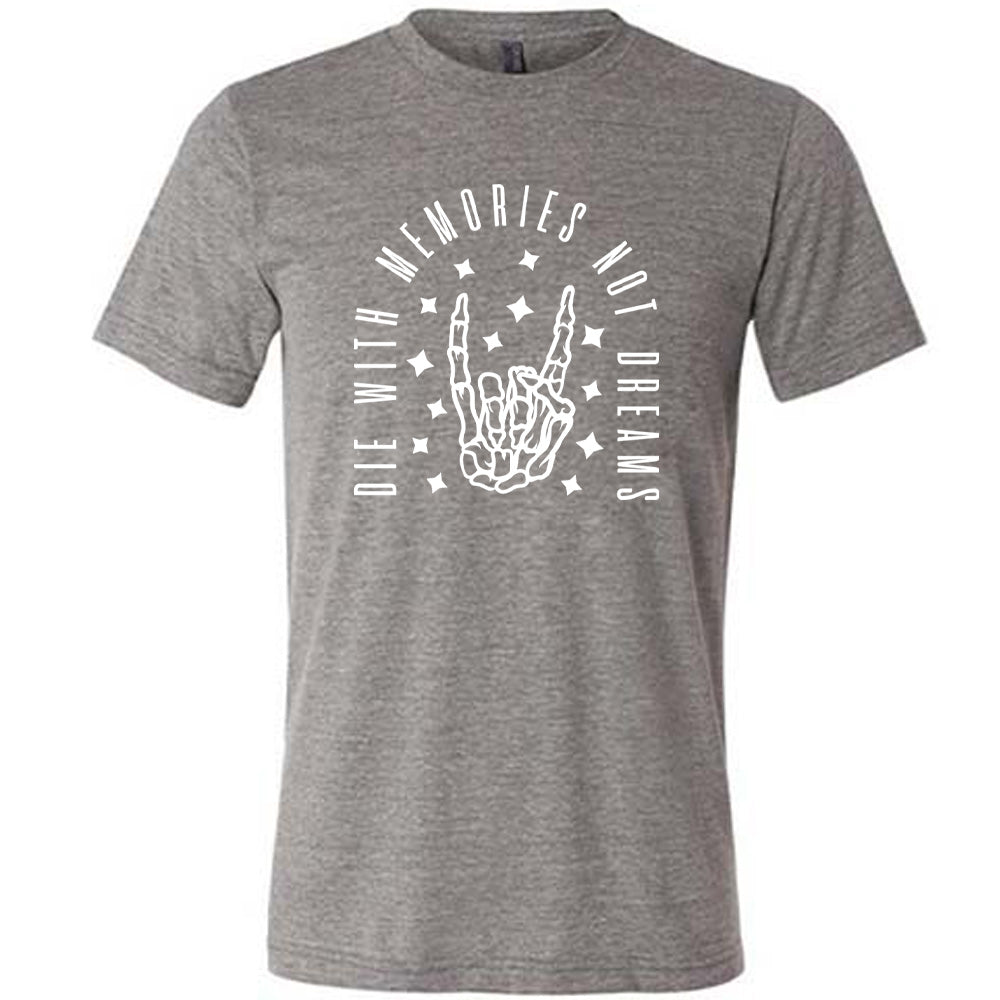 grey unisex tee with the graphic of a rocker skeleton hand, surrounded by little stars as well as an archway of text saying "die with memories not dreams"