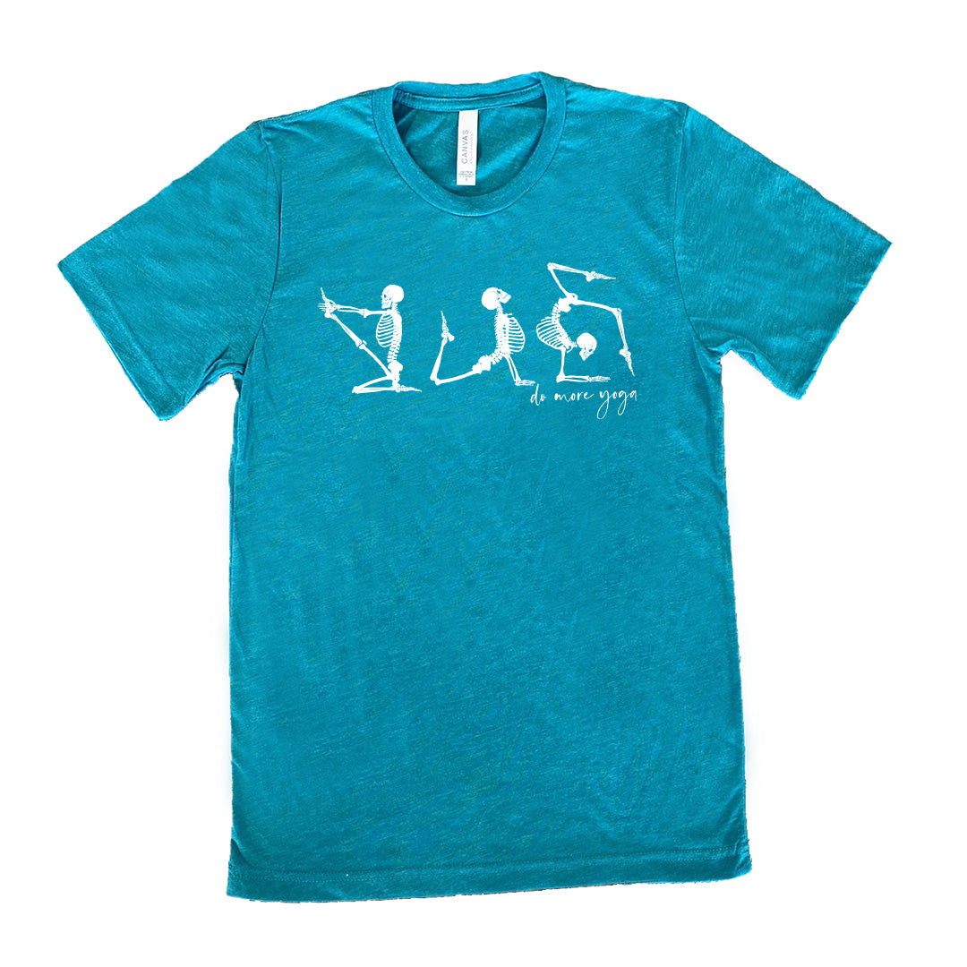 teal unisex tee with three skeleton graphics doing yoga, with the small words underneath saying "do more yoga"