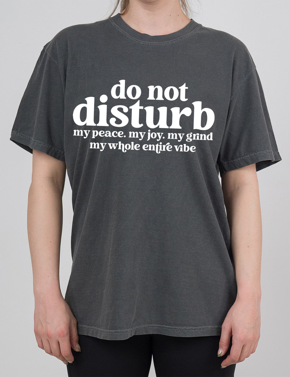 pepper modern tee with large words on it saying "do not disturb" followed by the smaller words "my peace. my joy. my grind my whole entire vibe"