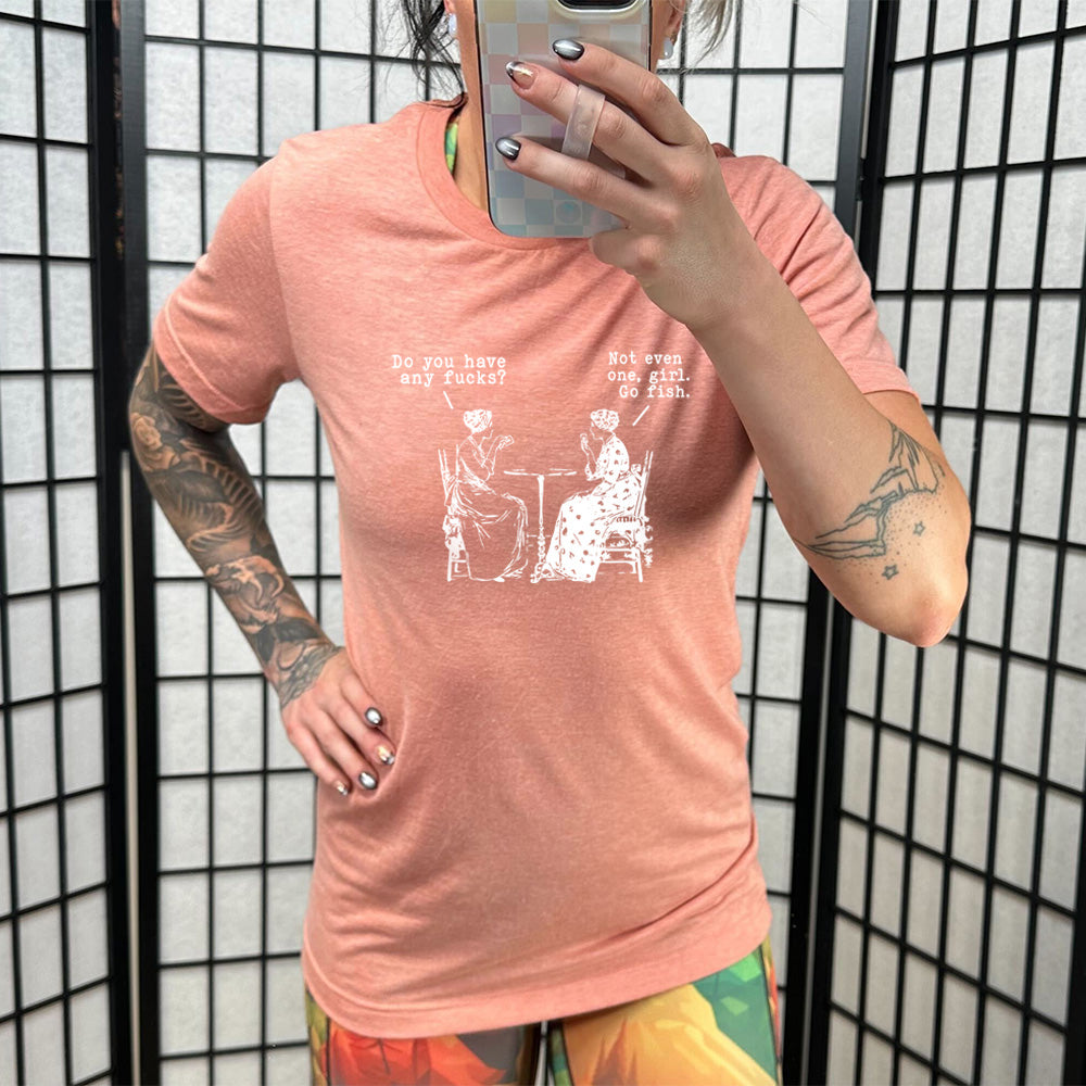 peach shirt with the text "Do You Have Any Fucks? Not Even One, Girl. Go Fish" on it