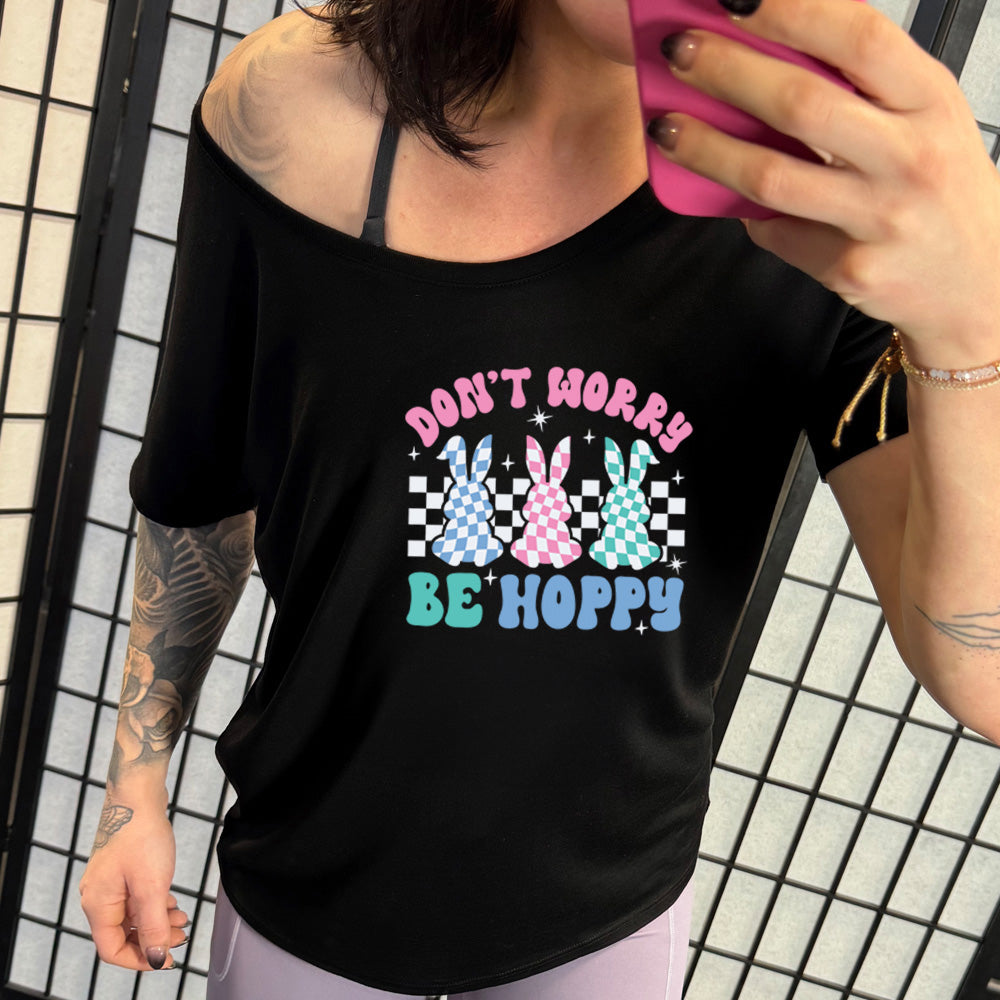 shirt with a checkered bunny graphic on it that says "Don't Worry Be Hoppy"