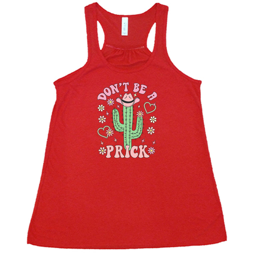 Red colored flowy tank with a cactus wearing a cowboy hat graphic on it that says "Don't Be A Prick"