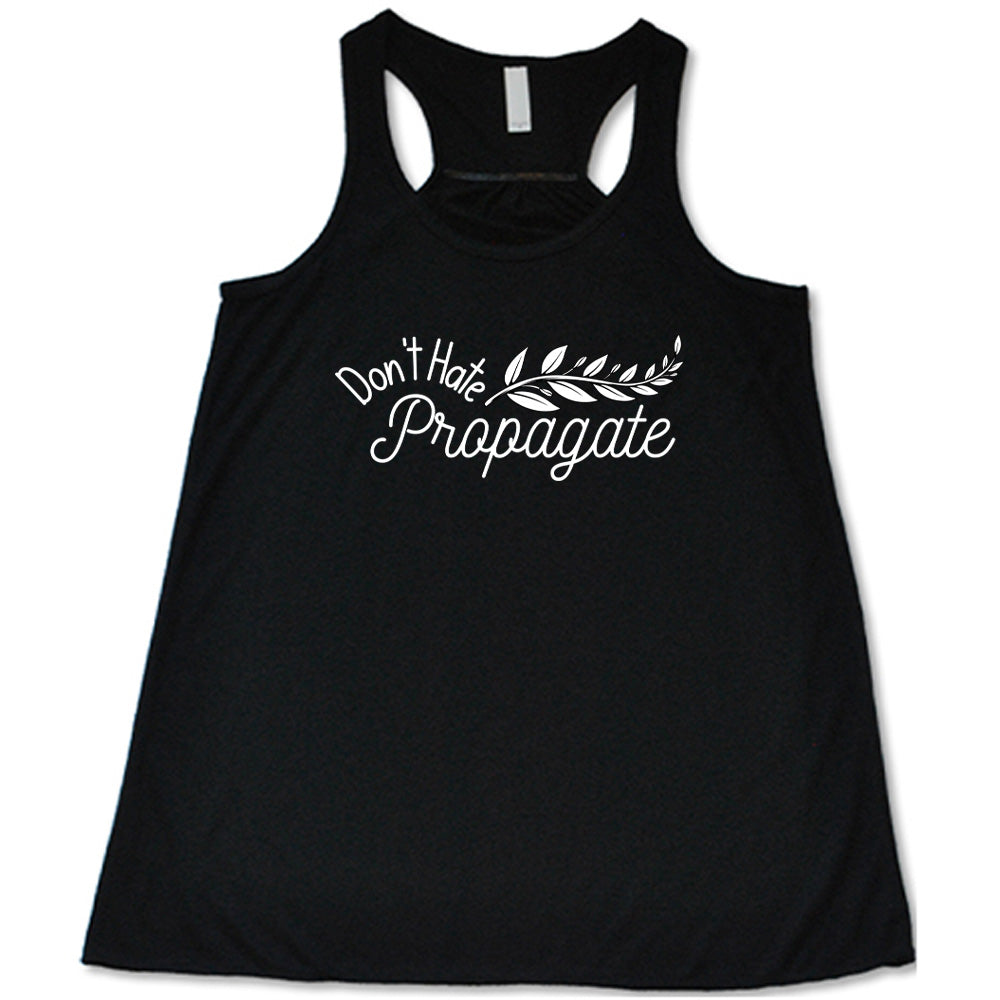 Black colored flowy tank with a plant graphic on it that says "Don't Hate, Propagate"