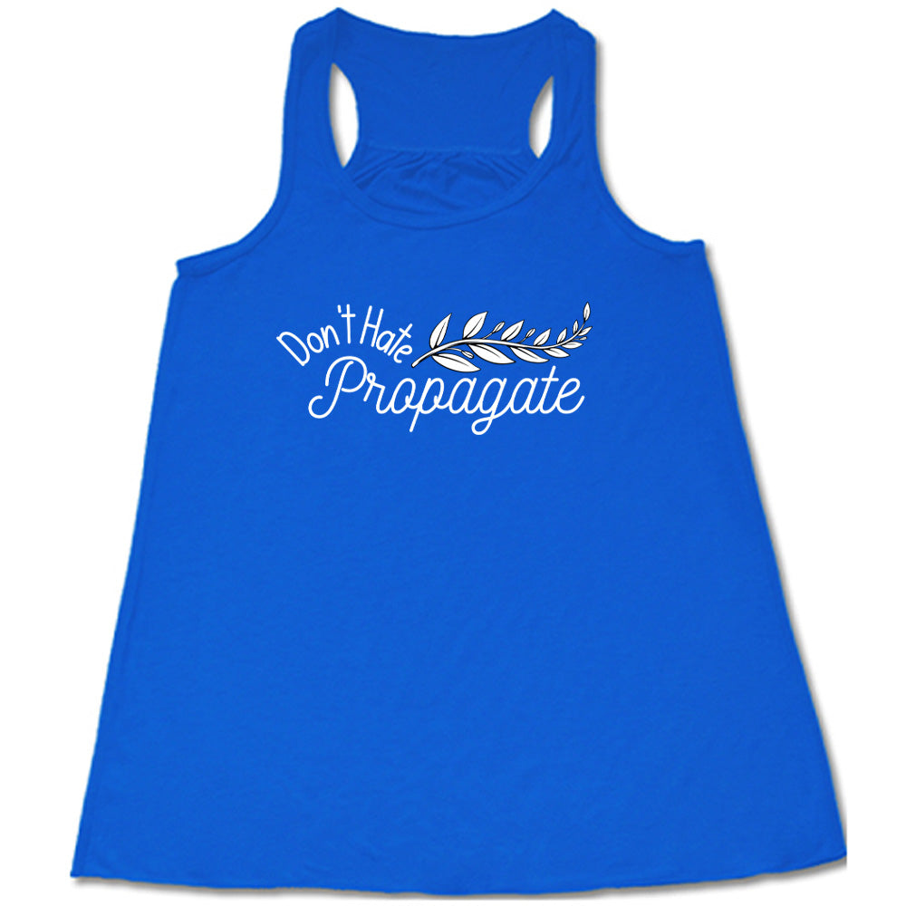 Blue colored flowy tank with a plant graphic on it that says "Don't Hate, Propagate"