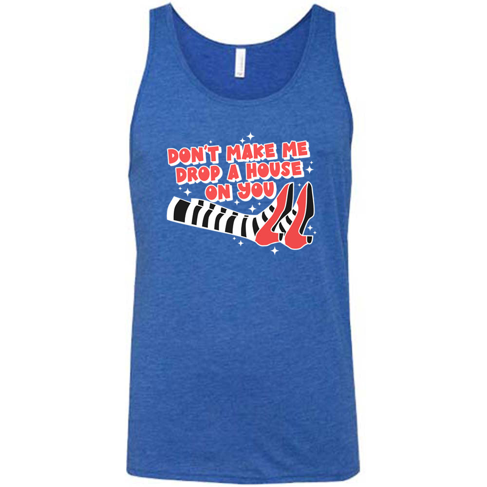 blue shirt with the text "Don't Make Me Drop A House On You" on it