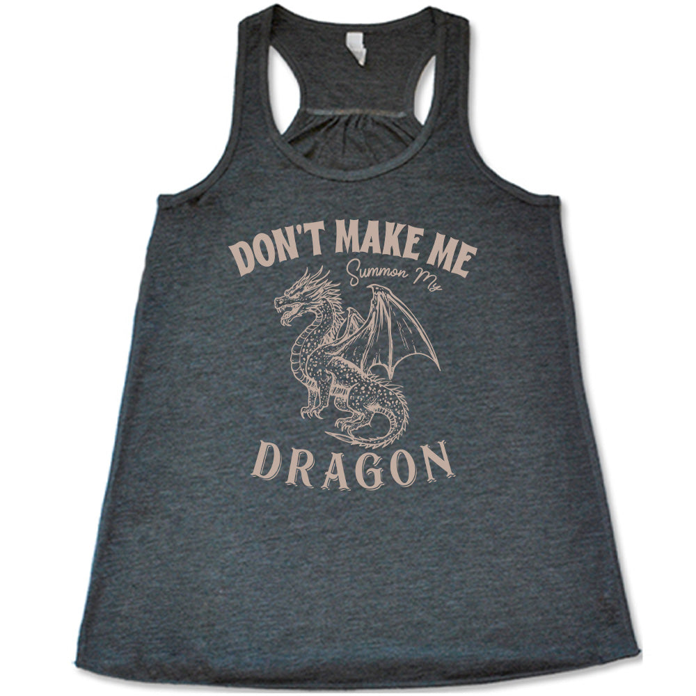 grey racerback flowy tank with the words "don't make me summon my dragon" on it, surrounding the graphic of a fierce-looking dragon