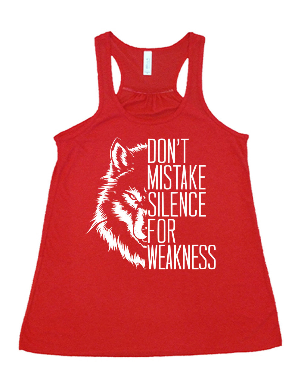 red flowy racerback tank with the graphic of half a wolf's head, and the words "don't mistake silence for weakness" making up the other half