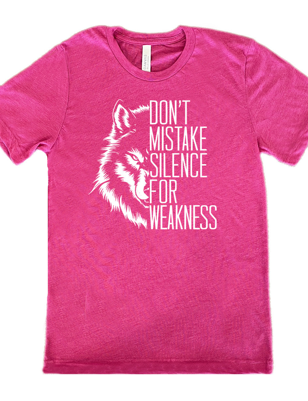 berry unisex tee with the graphic of half a wolf's head, and the words "don't mistake silence for weakness" making up the other half