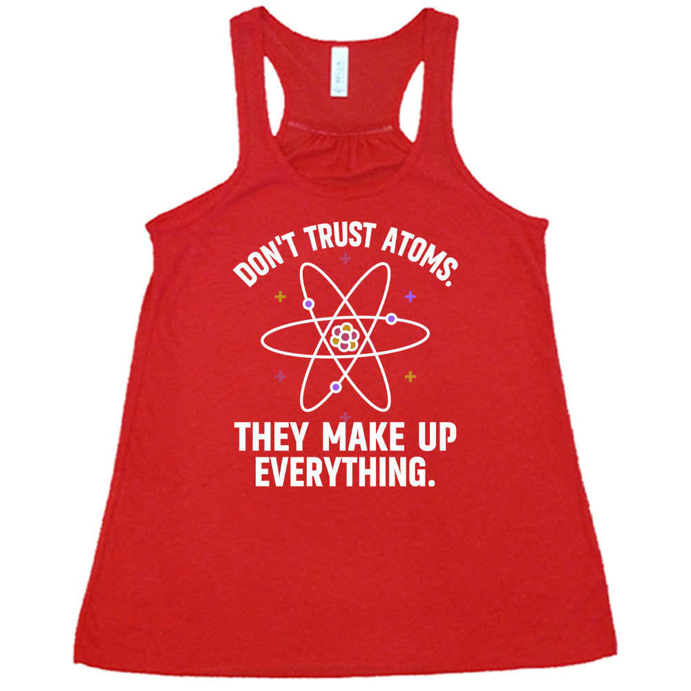 Red colored flowy tank with atom graphic on it that says "Don't Trust Atoms. They Make Up Everything."