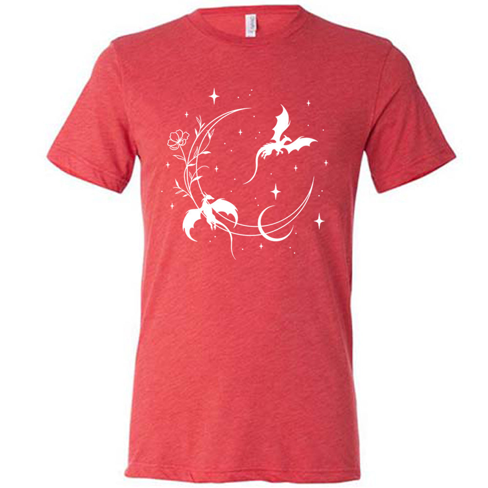 red unisex tee with the graphic of a large crescent moon, with a flower lining it, two dragons flying, another smaller moon, and many small stars