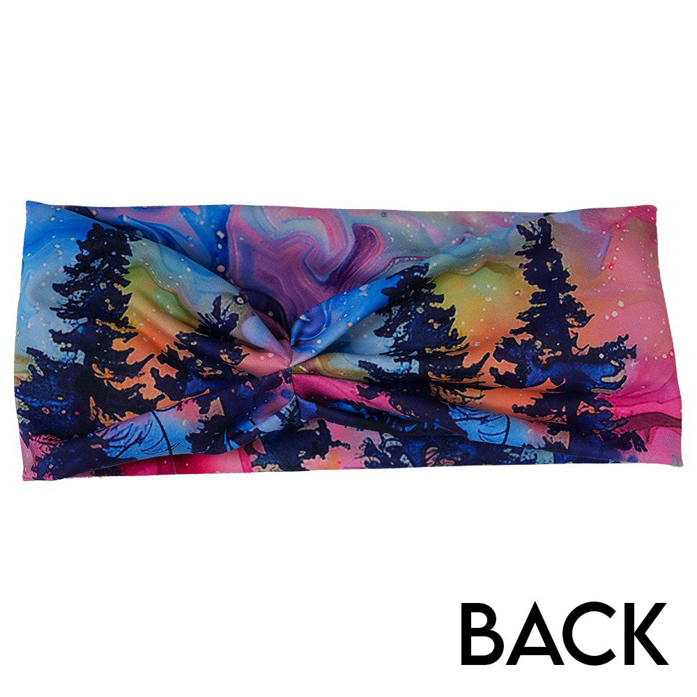 back of the watercolor rainbow patterned forest headband against a white background