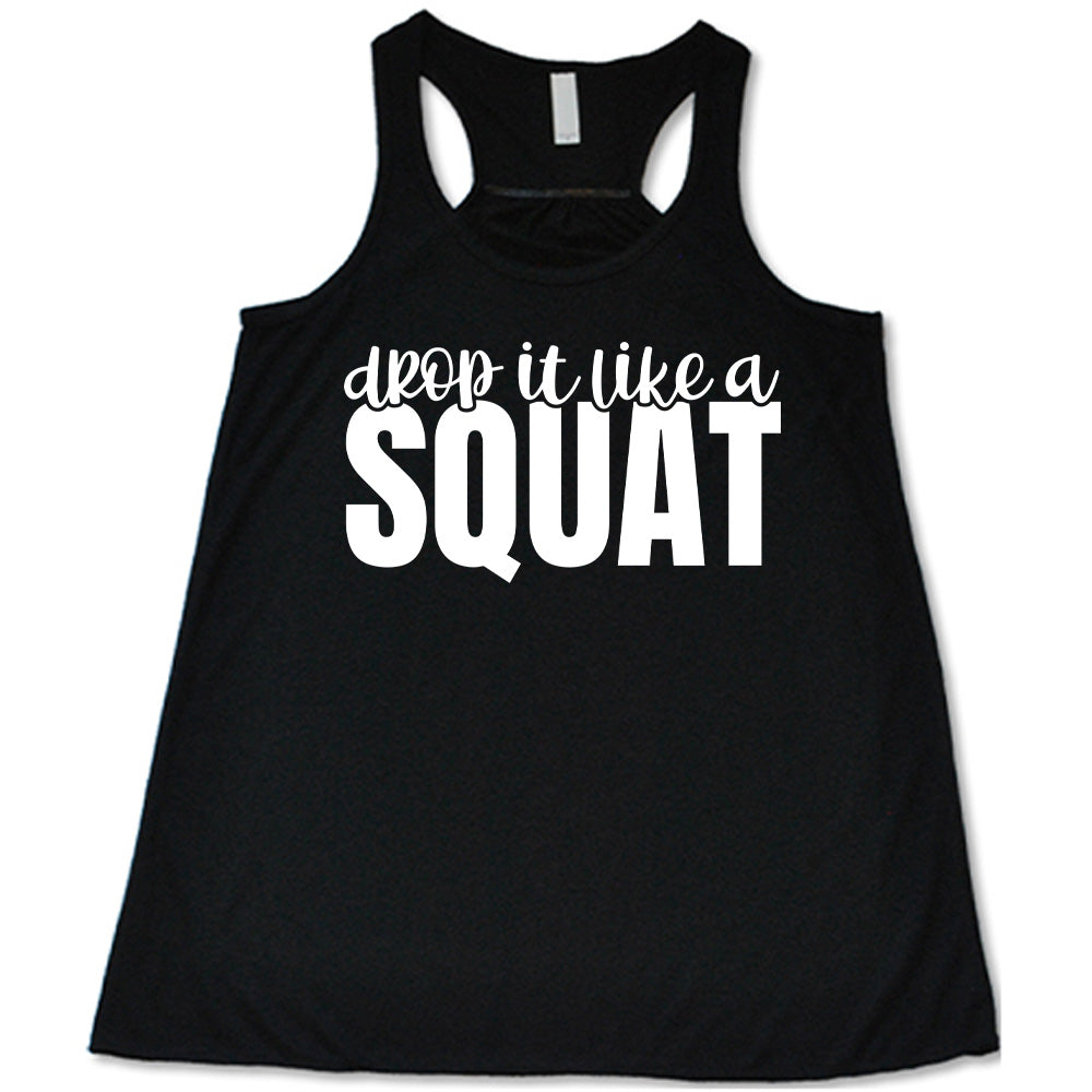 Black flowy tank with Drop it Like a Squat in white lettering
