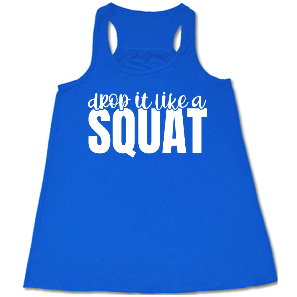 Blue flowy tank with Drop it Like a Squat in white lettering