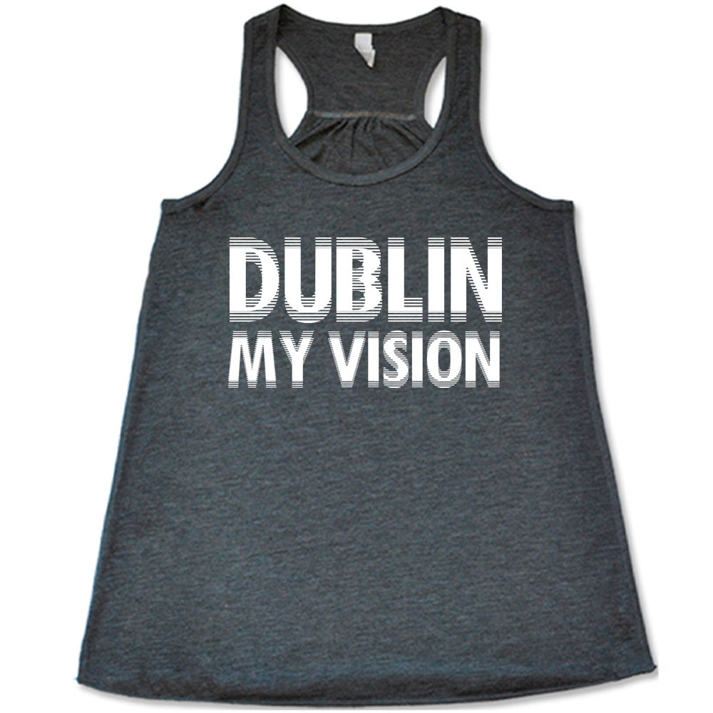 grey flowy tank with the words "dublin my vision" on it, displayed in a way to cause the optical illusion of blurred, doubled vision