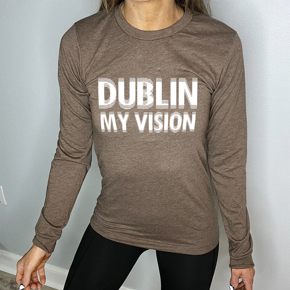 heather brown long sleeve with the words "dublin my vision" on it, displayed in a way to cause the optical illusion of blurred, doubled vision