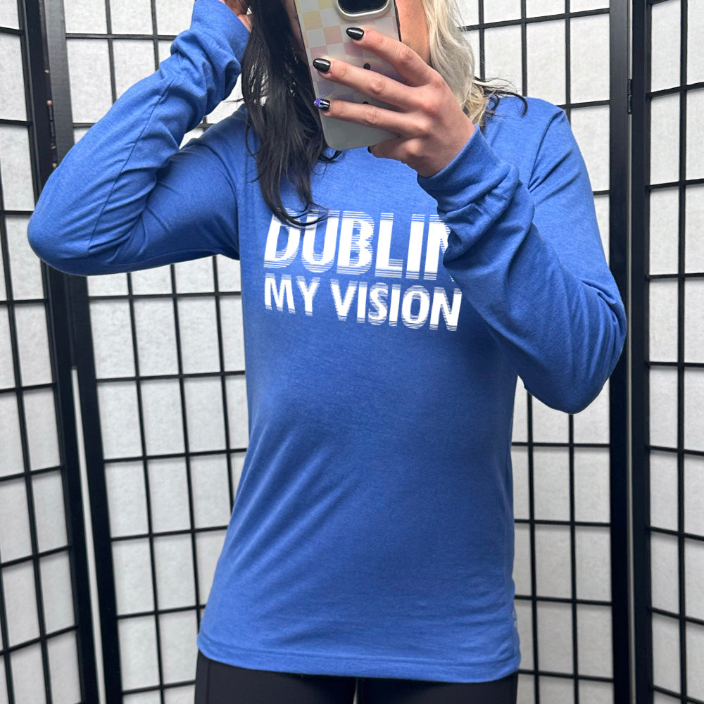 heather true royal long sleeve with the words "dublin my vision" on it, displayed in a way to cause the optical illusion of blurred, doubled vision