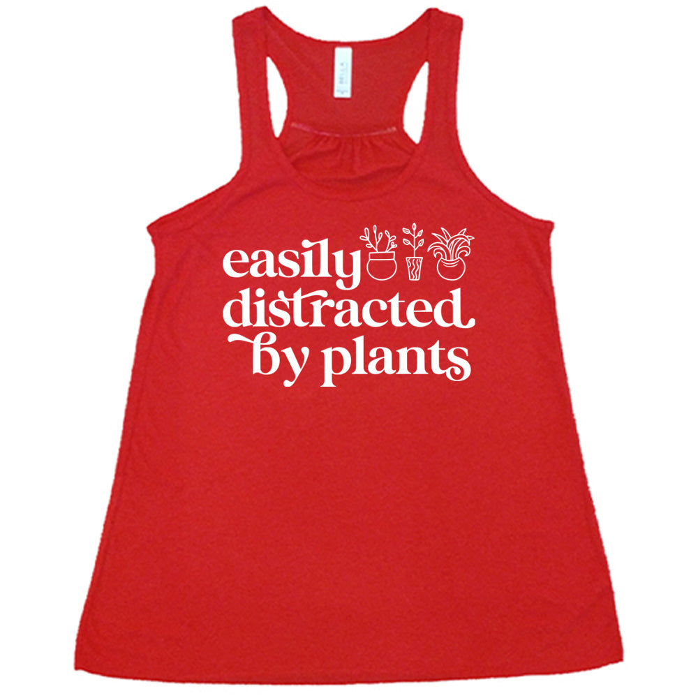 Red colored flowy tank with a potted plant graphic on it that says "Easily Distracted By Plants"