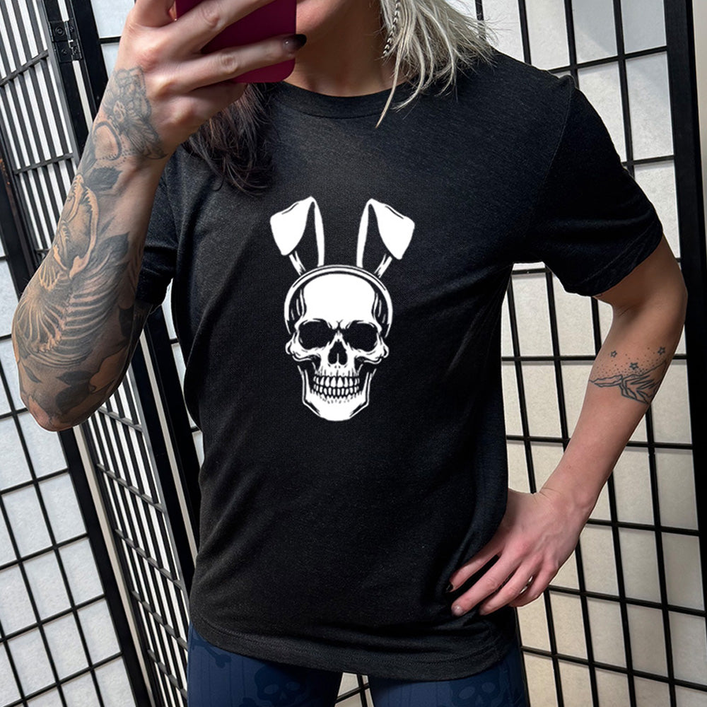 Black colored shirt with a skull wearing bunny ears graphic on it