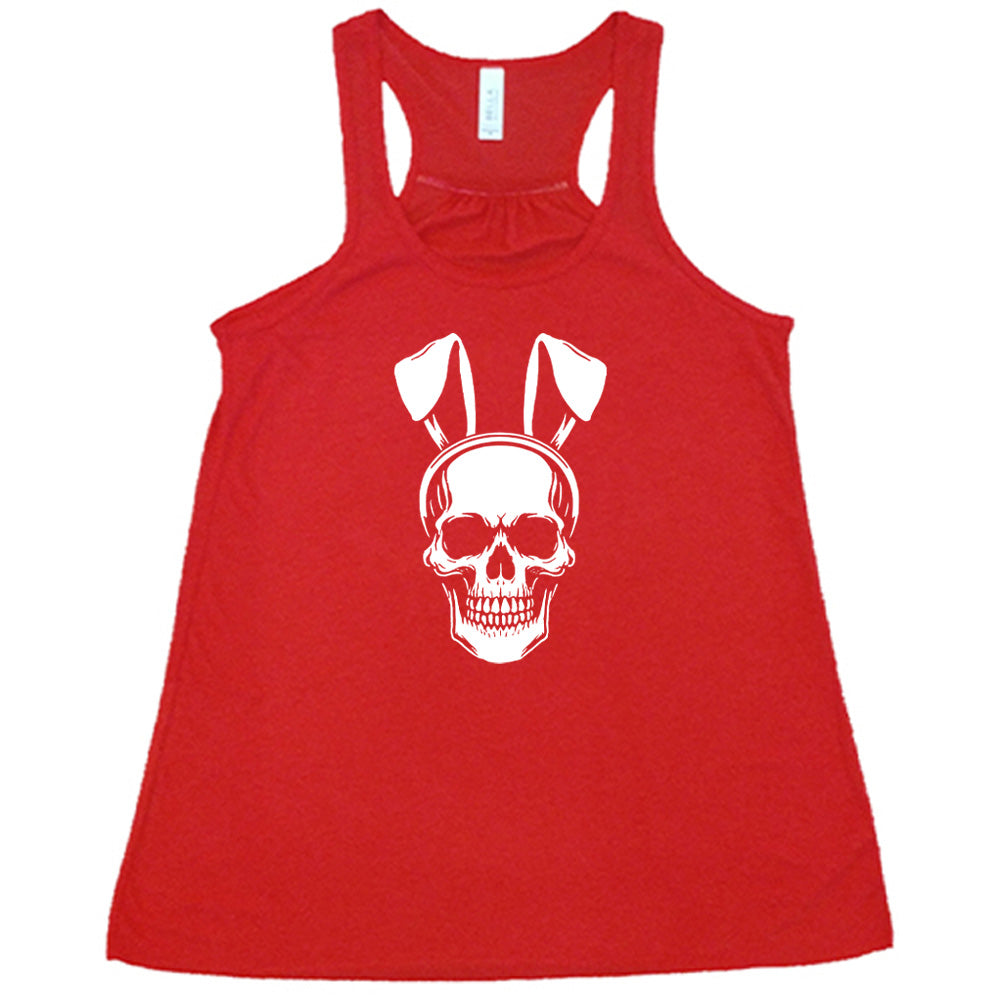 Red colored flowy tank with a skull wearing bunny ears graphic on it