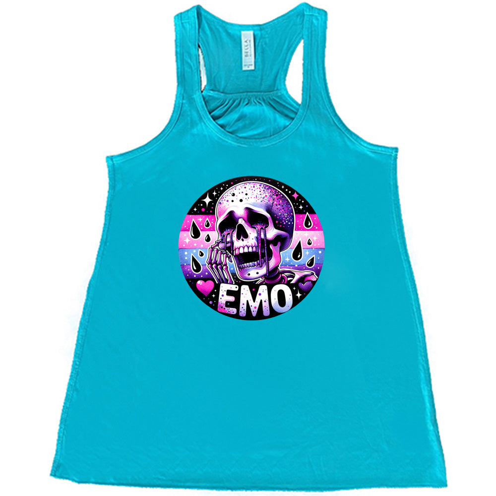 teal shirt with a crying skeleton graphic on it