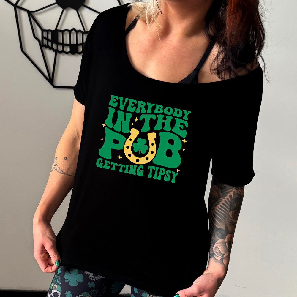 black slouchy shirt with the quote "Everybody In The Pub Getting Tipsy" on it