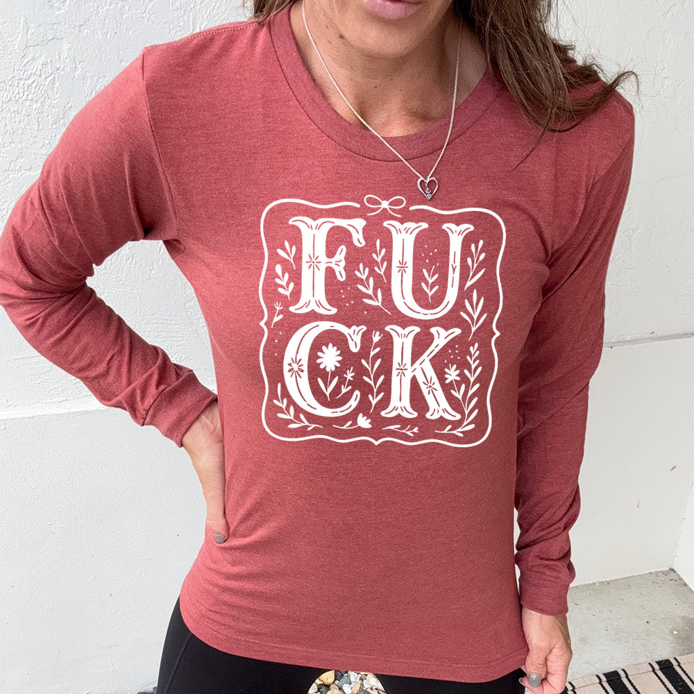 heather clay long sleeve shirt that has the word "FUCK" in large, flowery font, spaced out so that the F and U are directly above the C and K, and the word is surrounded by a a few branches and a boarder