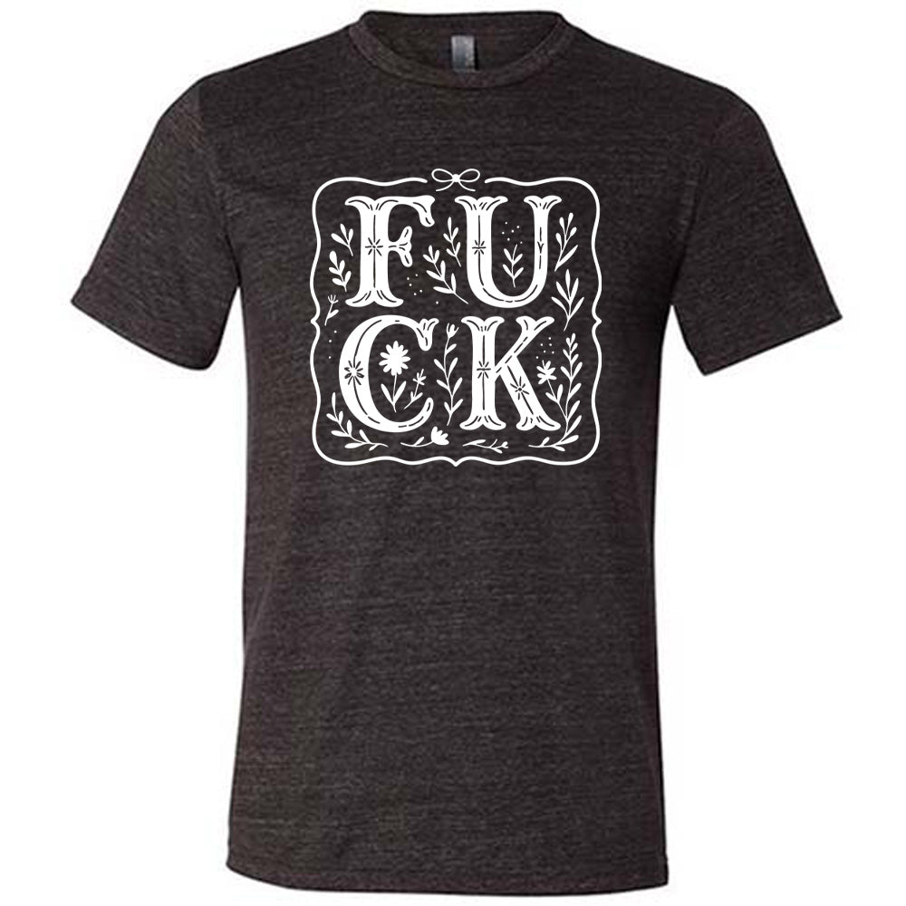 black unisex tee that has the word "FUCK" in large, flowery font, spaced out so that the F and U are directly above the C and K, and the word is surrounded by a a few branches and a boarder