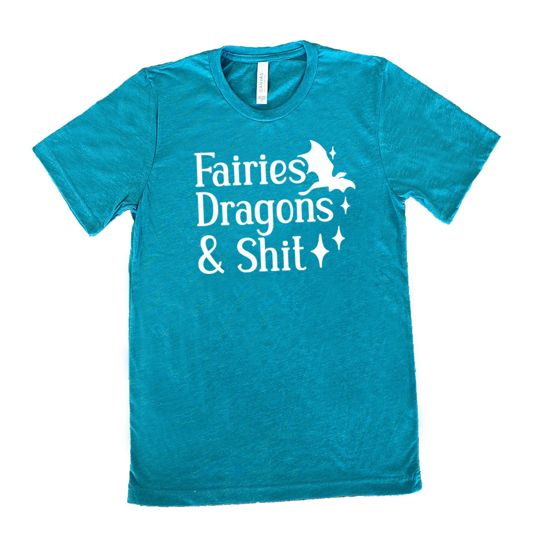 teal unisex tee with the words "fairies dragons & shit" on it, with the small graphic of a dragon and a few stars